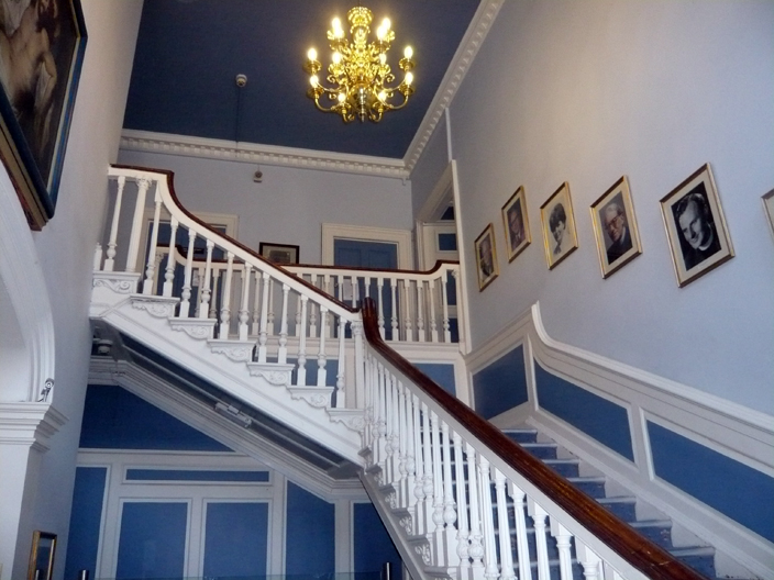 The grand staircase of the Eden family house, an exceptionally fine example of carved woodwork. 